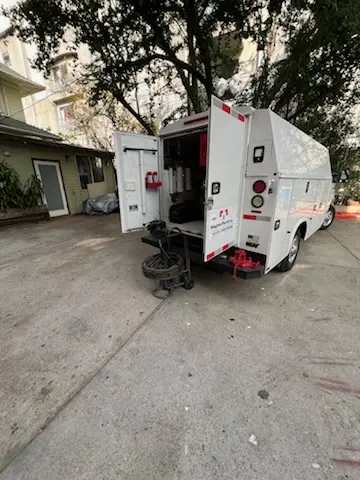 Magnet Plumbing service vehicle on-site for Grease Trap Cleaning in Plantation Woods